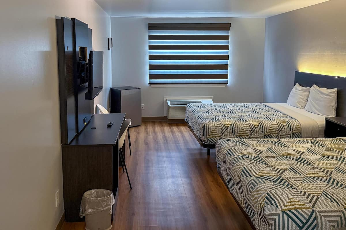 Desk, laptop workspace, free WiFi, bed sheets