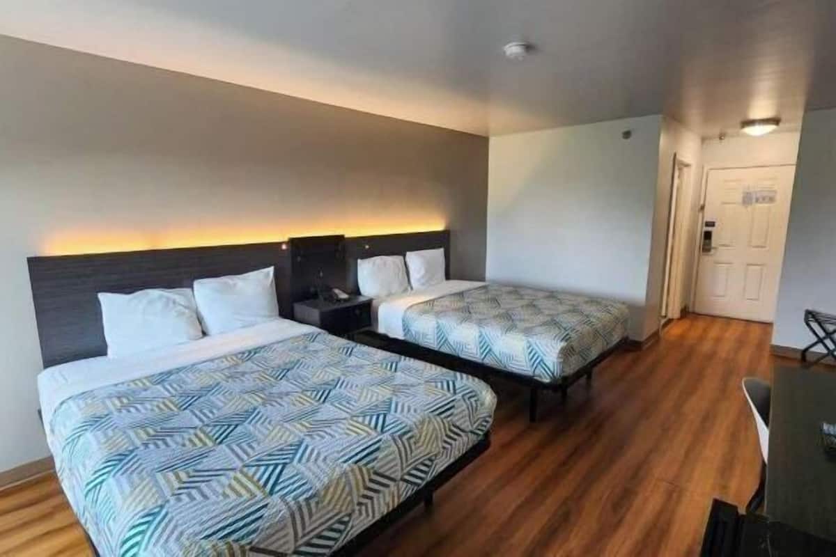 Desk, laptop workspace, free WiFi, bed sheets