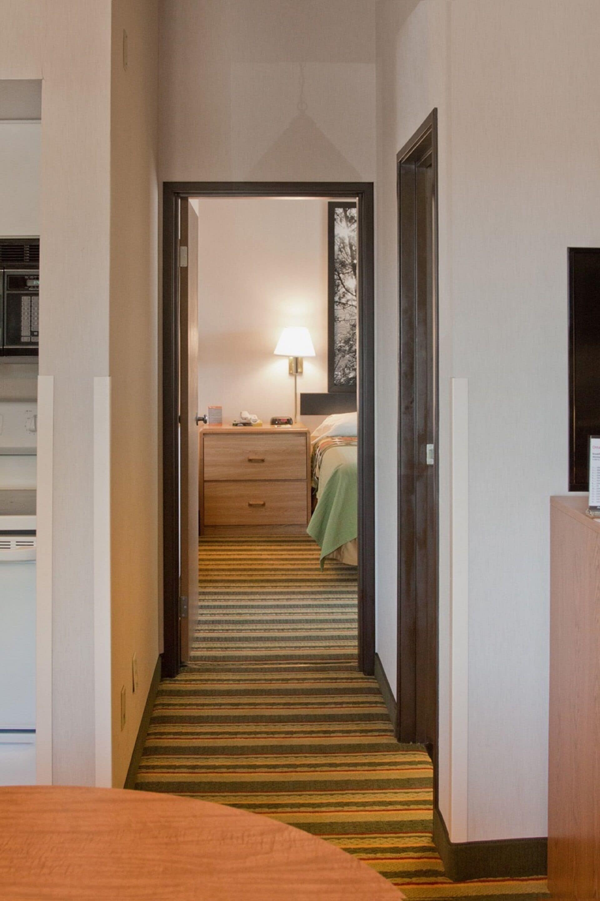 efficiency, room, 1 king bed, non smoking | in-room safe, desk, iron/ironing board, free cots/infant beds