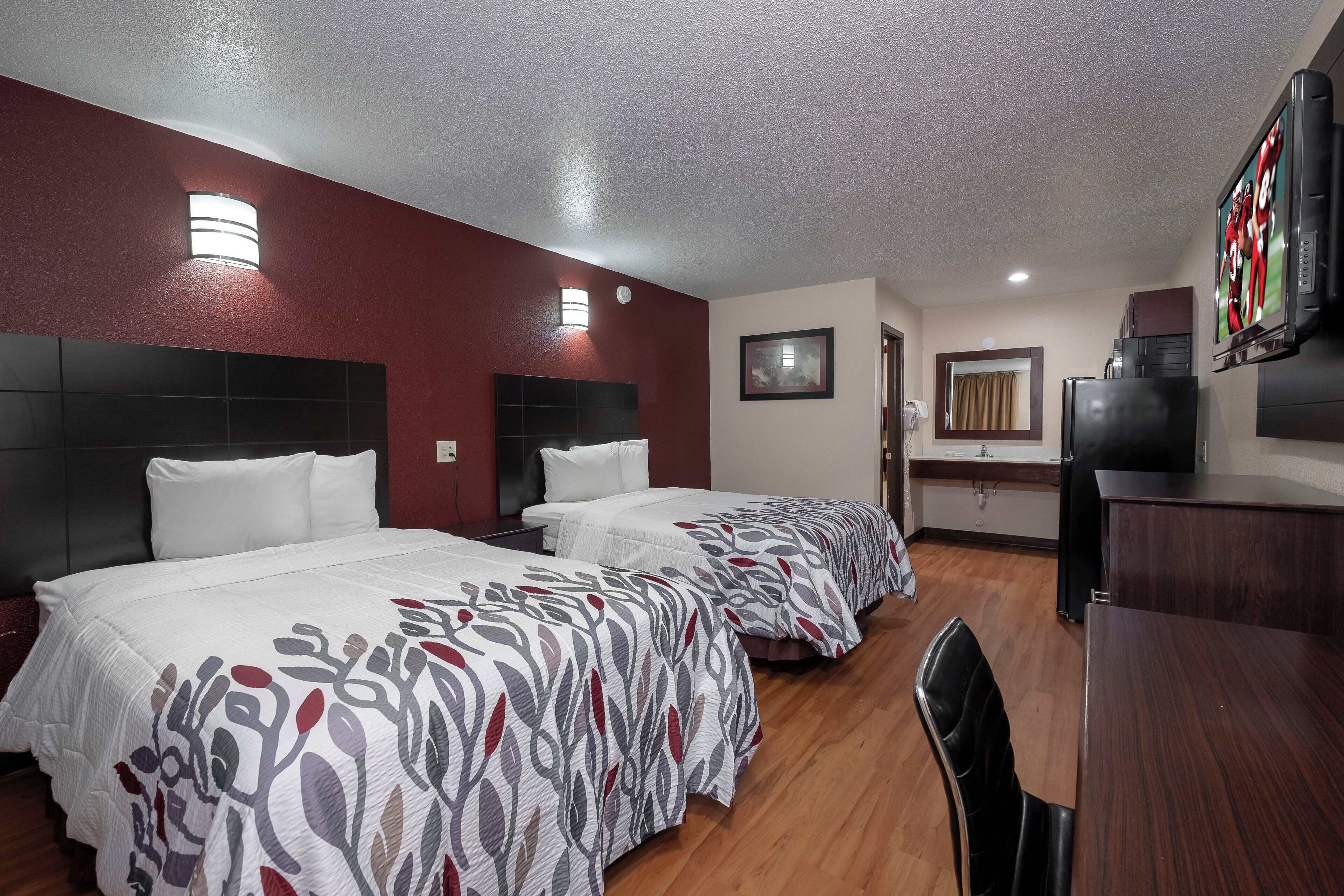 Premium bedding, down comforters, pillowtop beds, desk