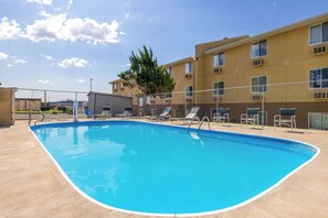 Outdoor pool, open 9:00 AM to 9:00 PM, sun loungers
