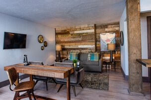 Pop Rocks Suite, 2 Bedrooms, Kitchen | Living area | 32-inch TV with cable channels