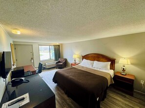 Escritorio, cortinas opacas, wifi gratis y ropa de cama