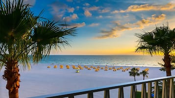 On the beach, white sand, beach volleyball, beach bar