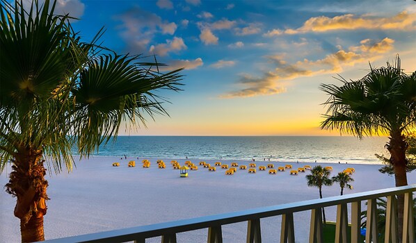 On the beach, white sand, beach volleyball, beach bar