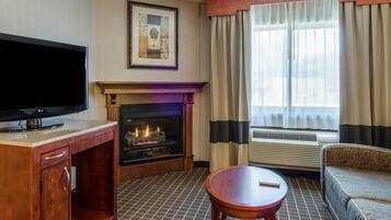 Camas con pillow-top, cortinas blackout y tabla de planchar con plancha