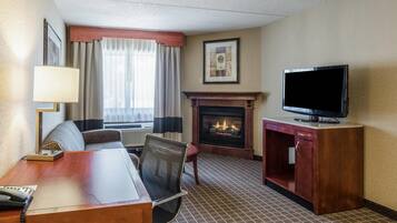 Camas con pillow-top, cortinas blackout y tabla de planchar con plancha