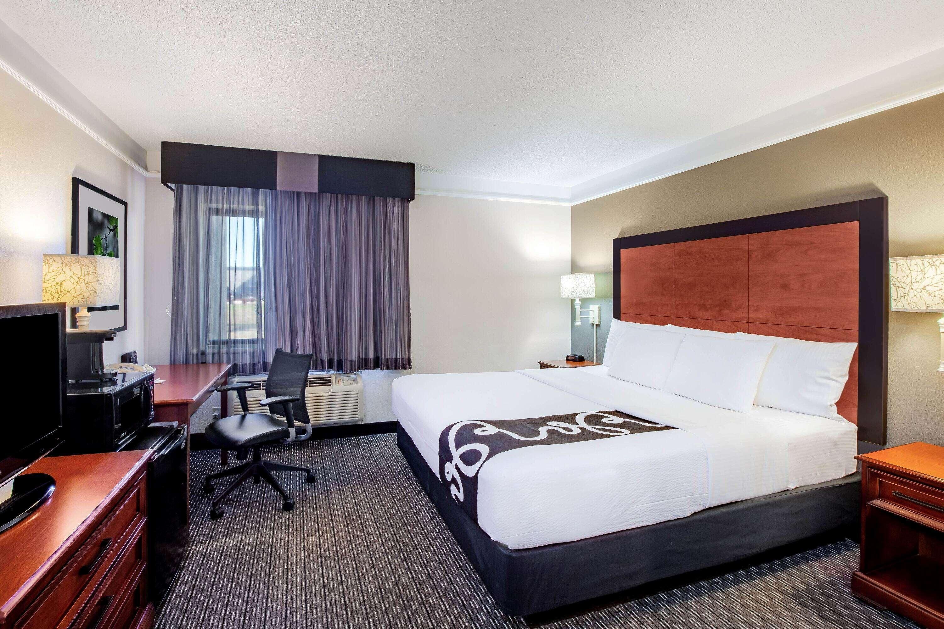 Premium bedding, desk, blackout curtains, iron/ironing board