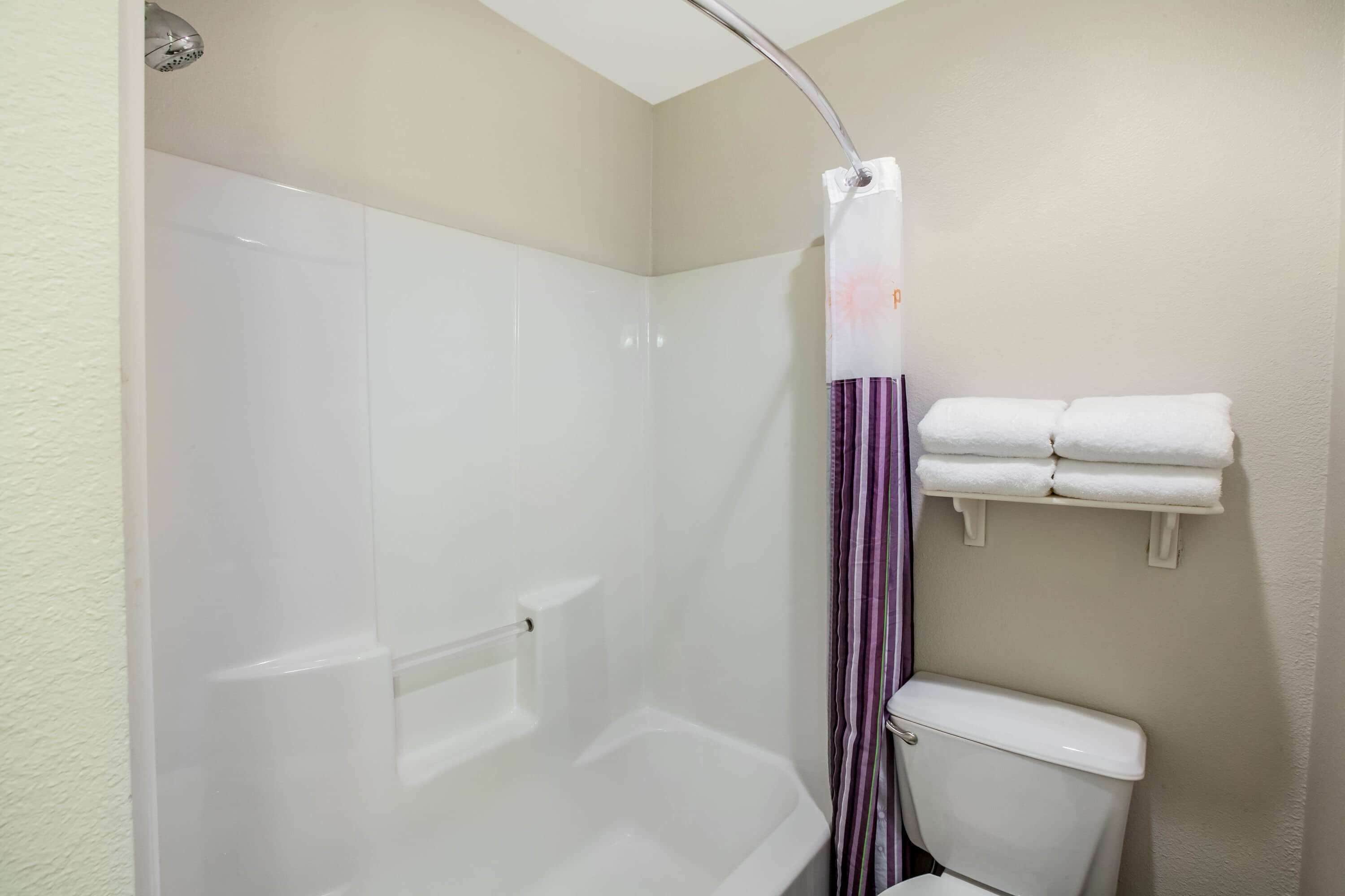 combined shower/bathtub, free toiletries, hair dryer, towels