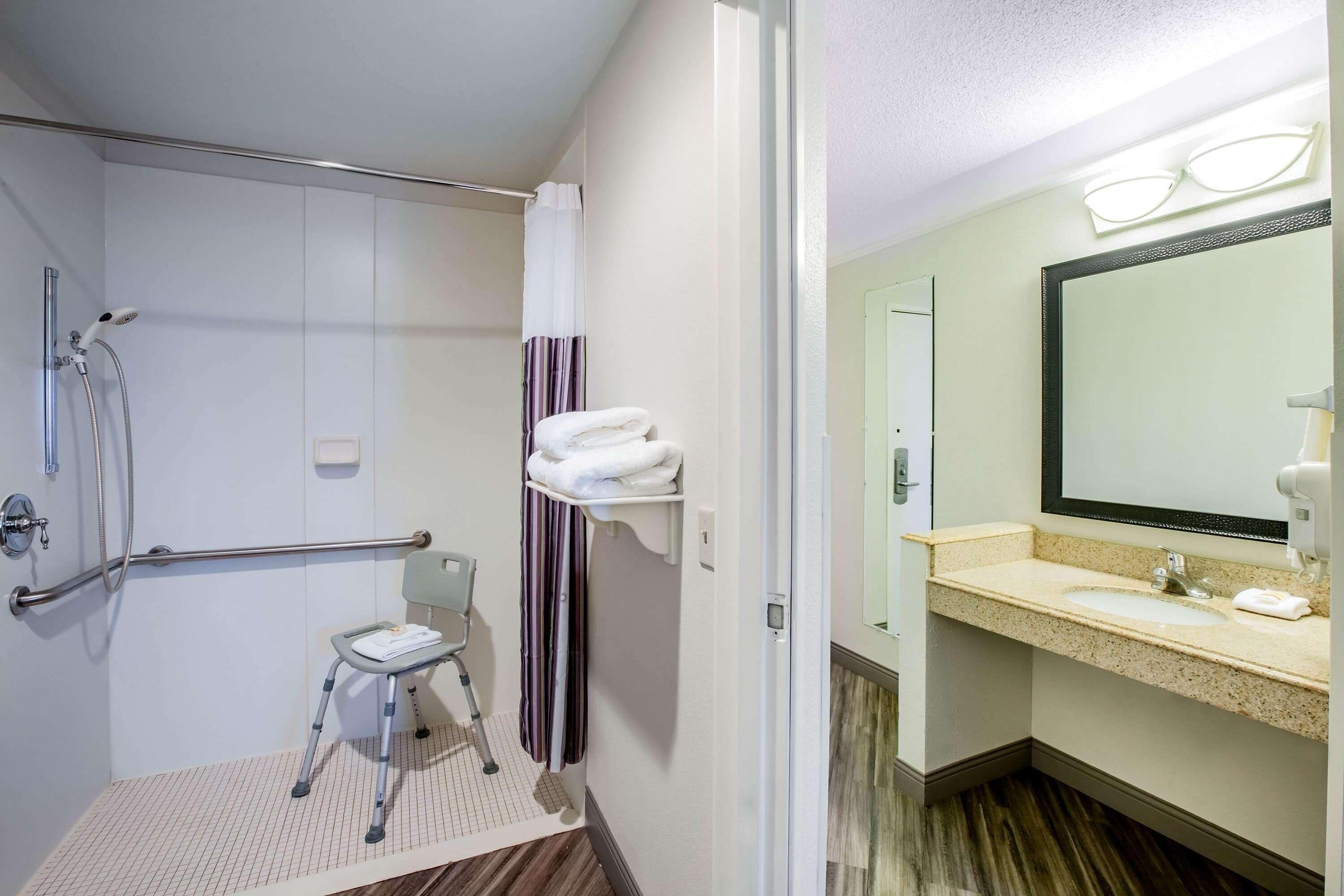 room, 1 king bed, accessible, non smoking (mobility, roll-in shower) | bathroom | combined shower/bathtub, free toiletries, hair dryer, towels