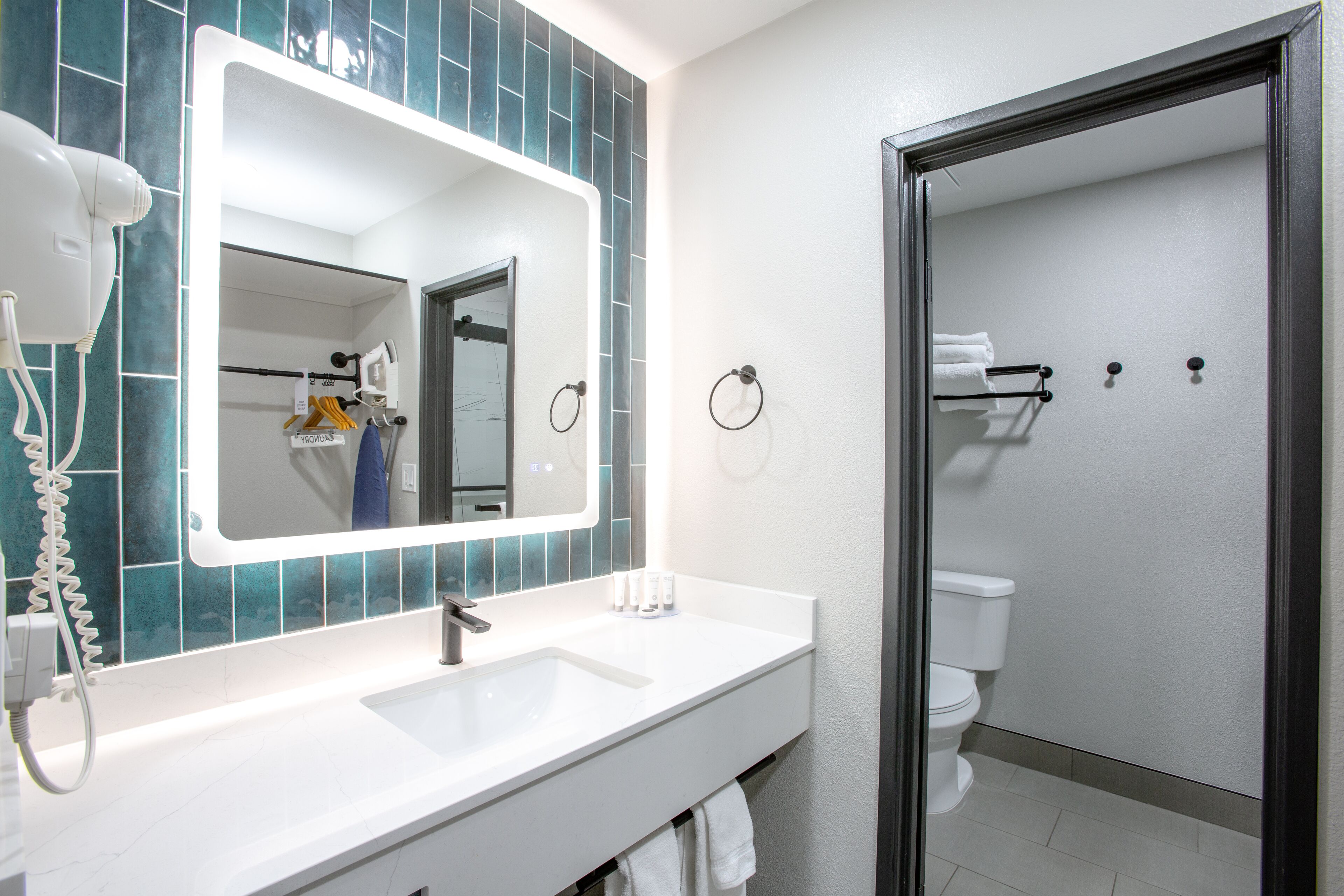 shower, free toiletries, hair dryer, towels