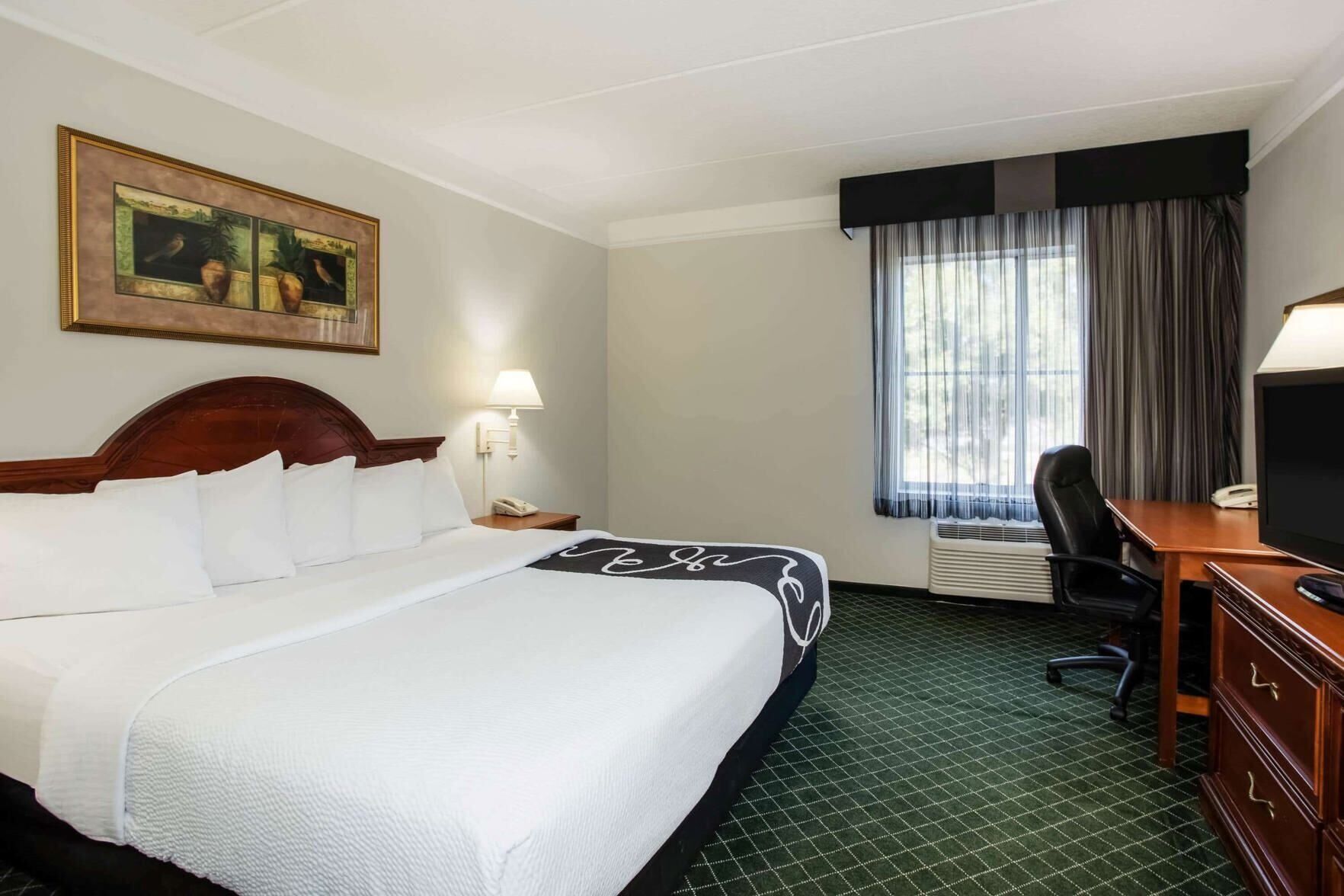 Pillowtop beds, desk, blackout drapes, iron/ironing board