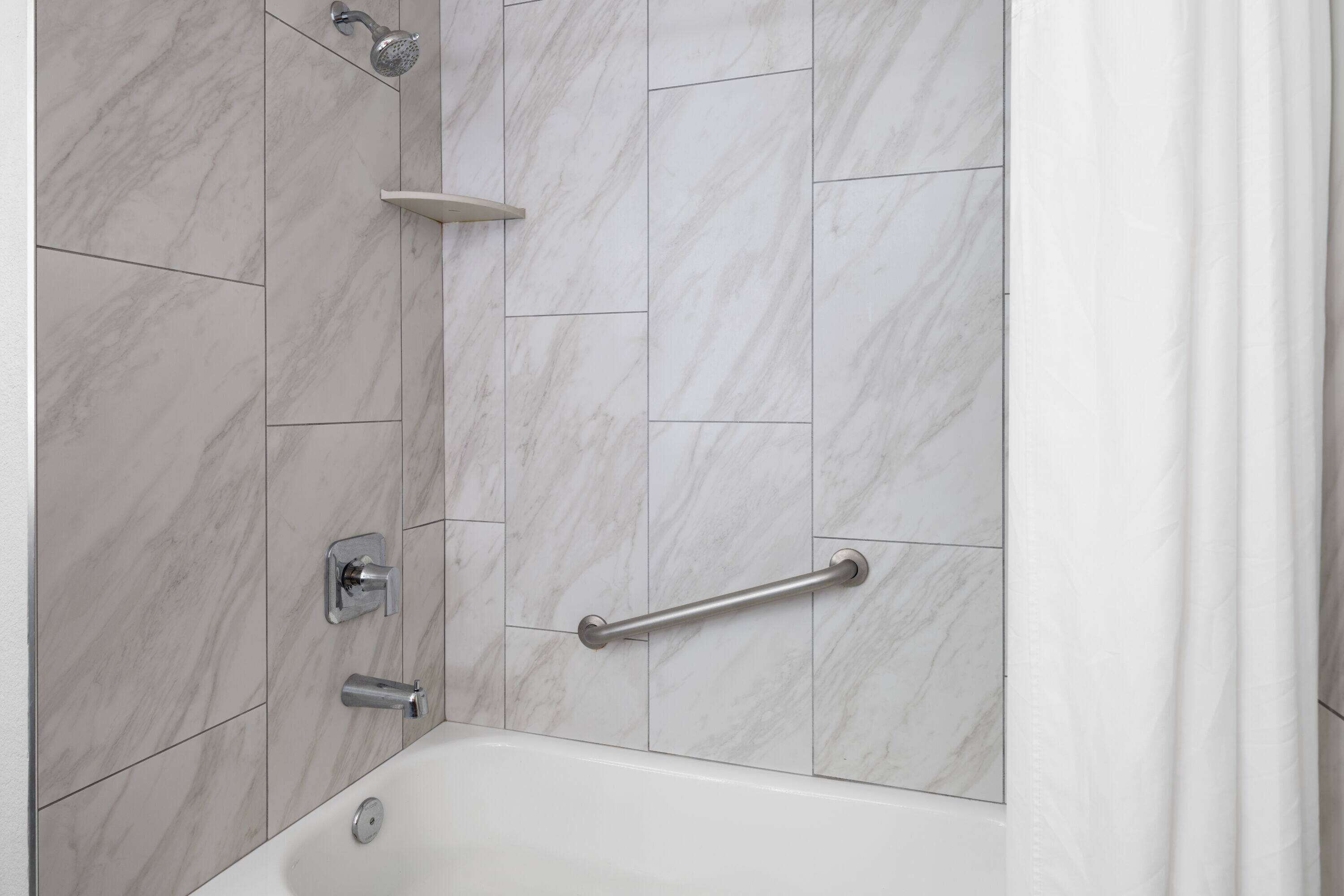 combined shower/bathtub, free toiletries, hair dryer, towels