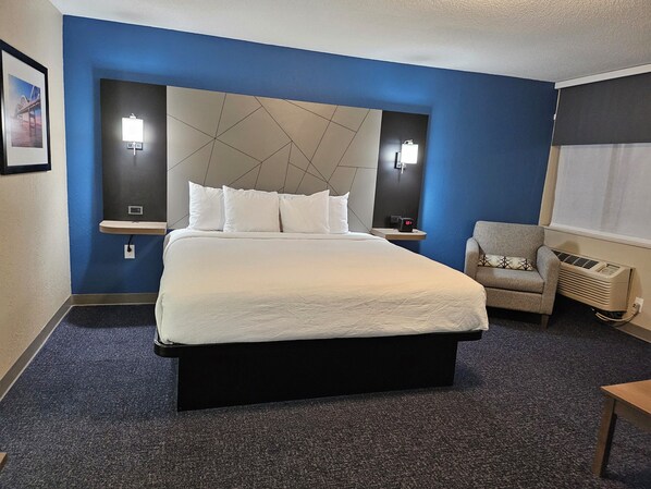 Standard Room, 1 King Bed | In-room safe, individually decorated, individually furnished, desk