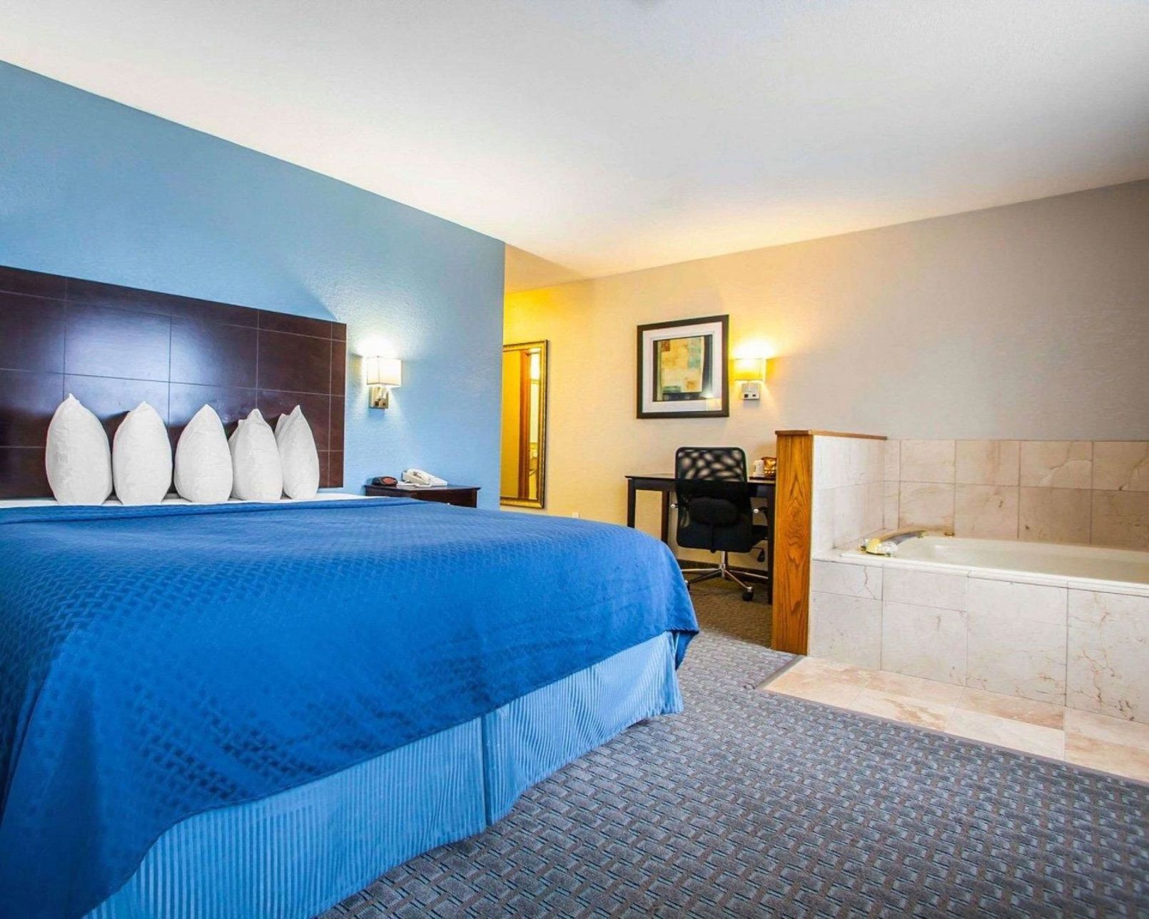 Premium bedding, desk, blackout curtains, iron/ironing board