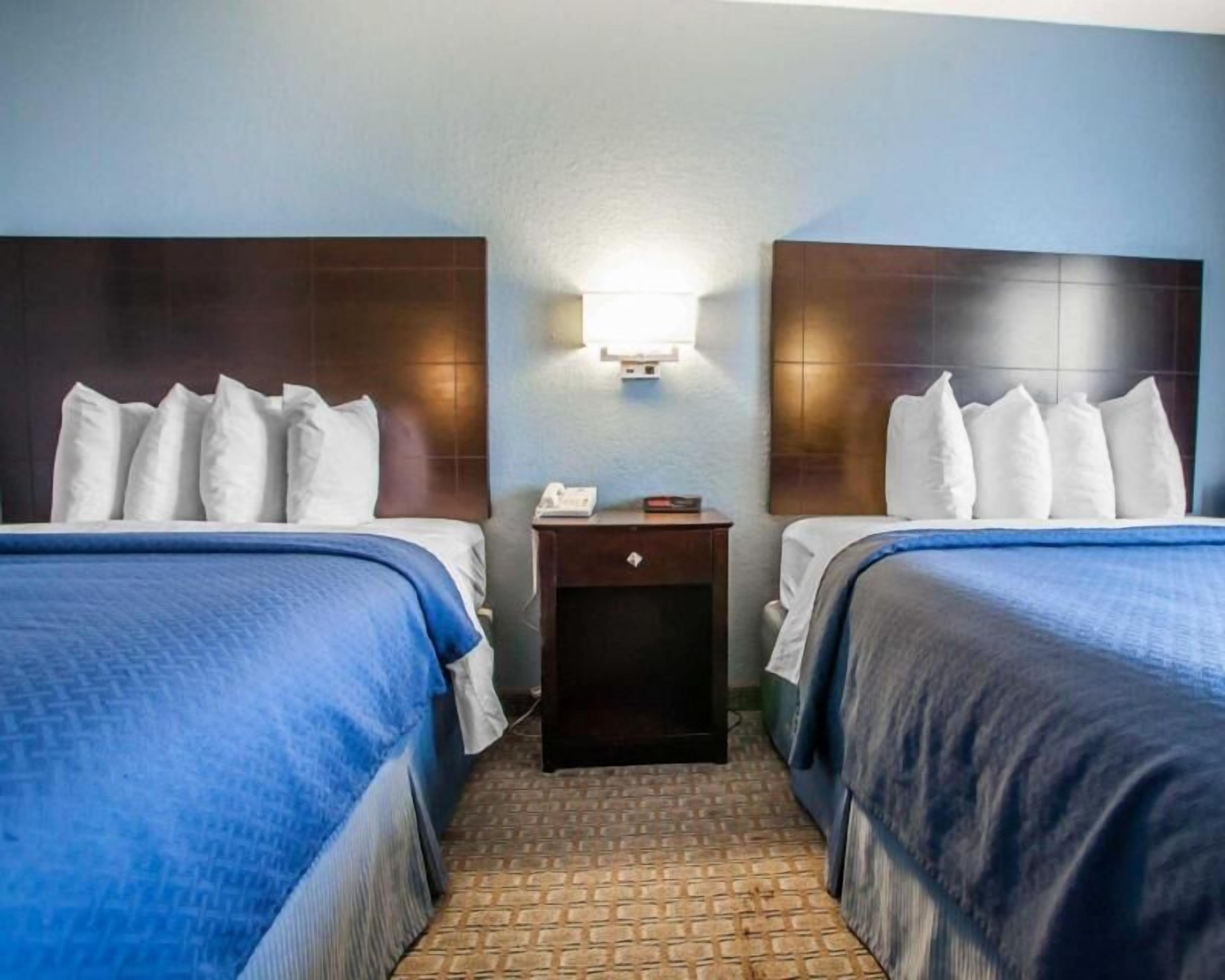 Premium bedding, desk, blackout curtains, iron/ironing board