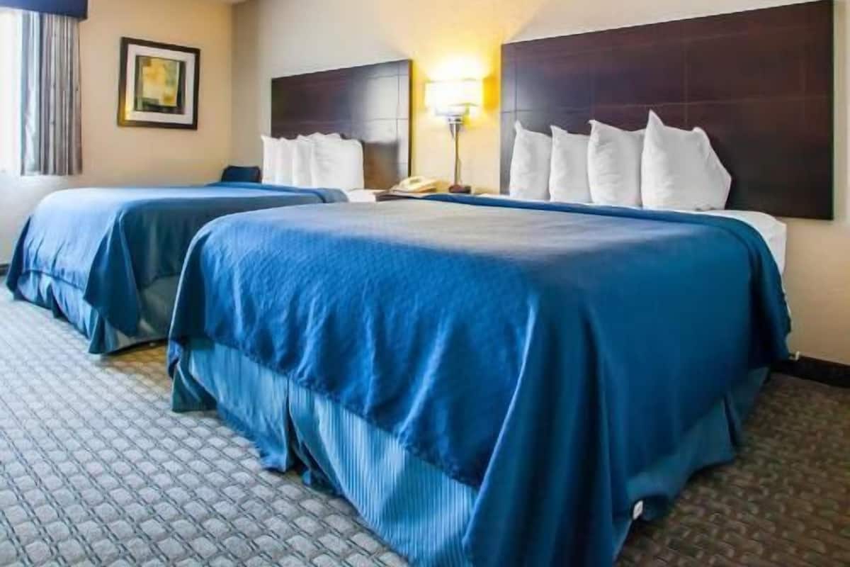Premium bedding, desk, blackout curtains, iron/ironing board