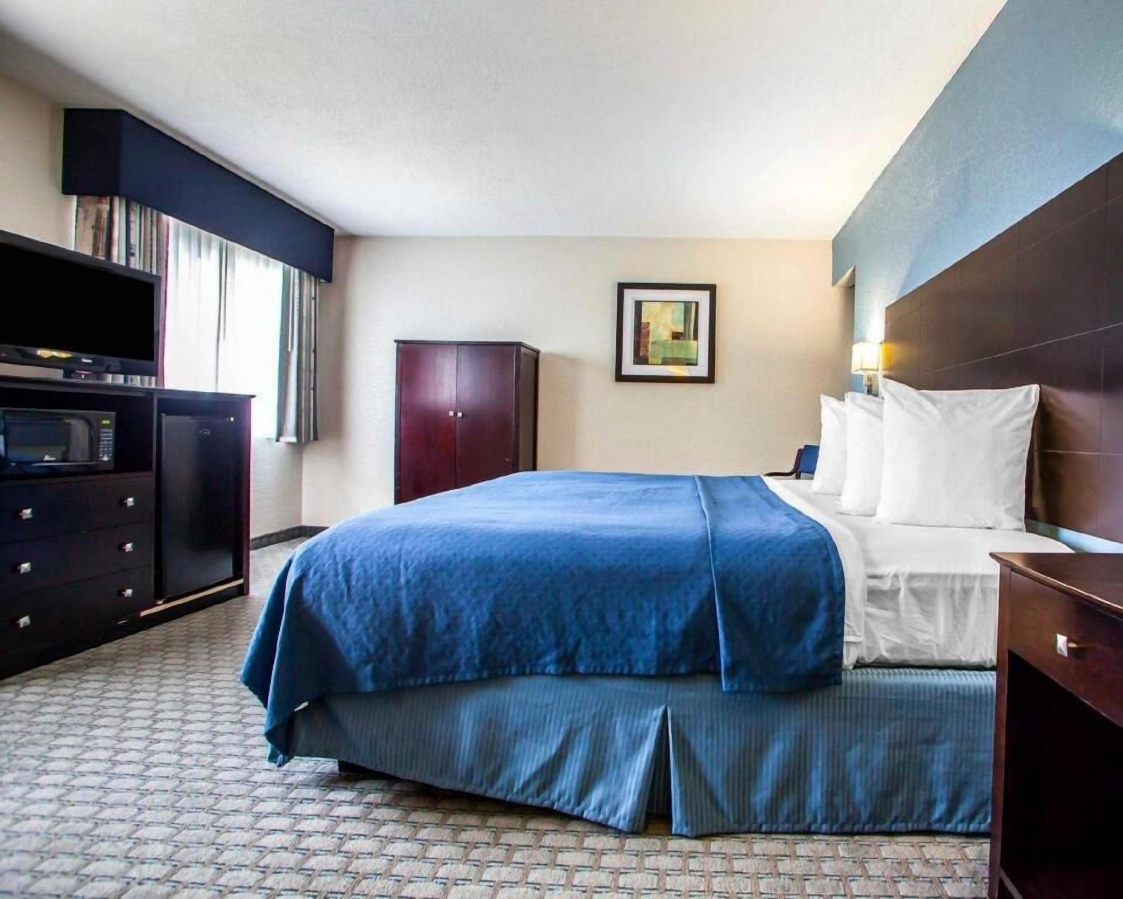 Premium bedding, desk, blackout curtains, iron/ironing board