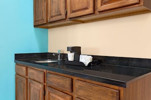 Studio Suite, 1 King Bed, Non Smoking | Desk, blackout drapes, iron/ironing board, free cribs/infant beds
