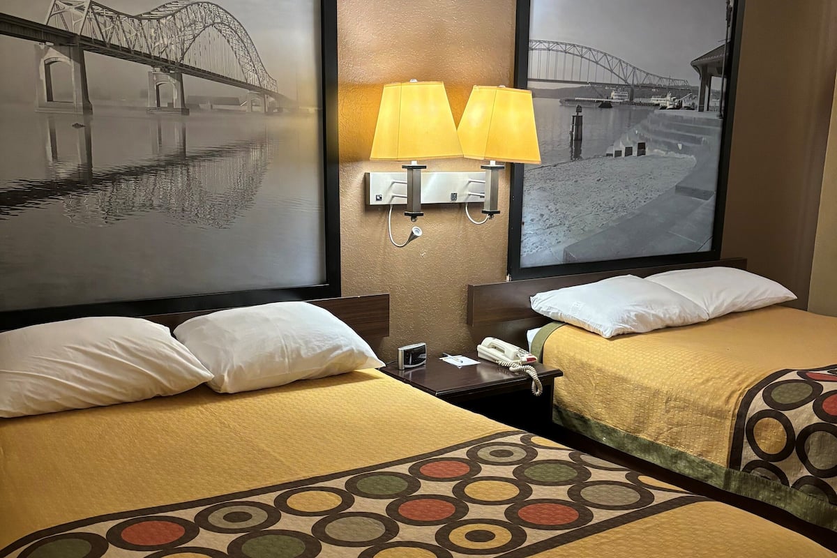 double room, 2 double beds | desk, blackout curtains, iron/ironing board, free cots/infant beds