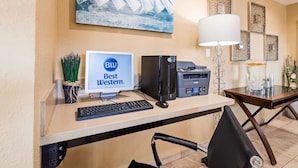 A hotel reception desk with a computer, printer, keyboard, and mouse. - Best Western Poway/San Diego Hotel (Poway)