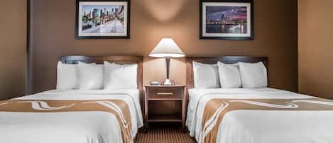 Premium bedding, desk, iron/ironing board, free cribs/infant beds