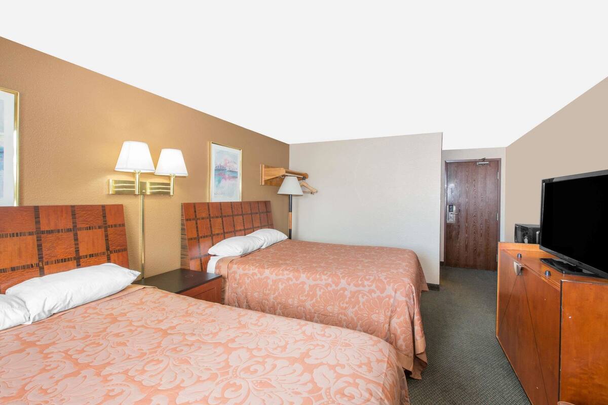 Standard Room, 2 Queen Beds | In-room safe, desk, iron/ironing board, free cots/infant beds