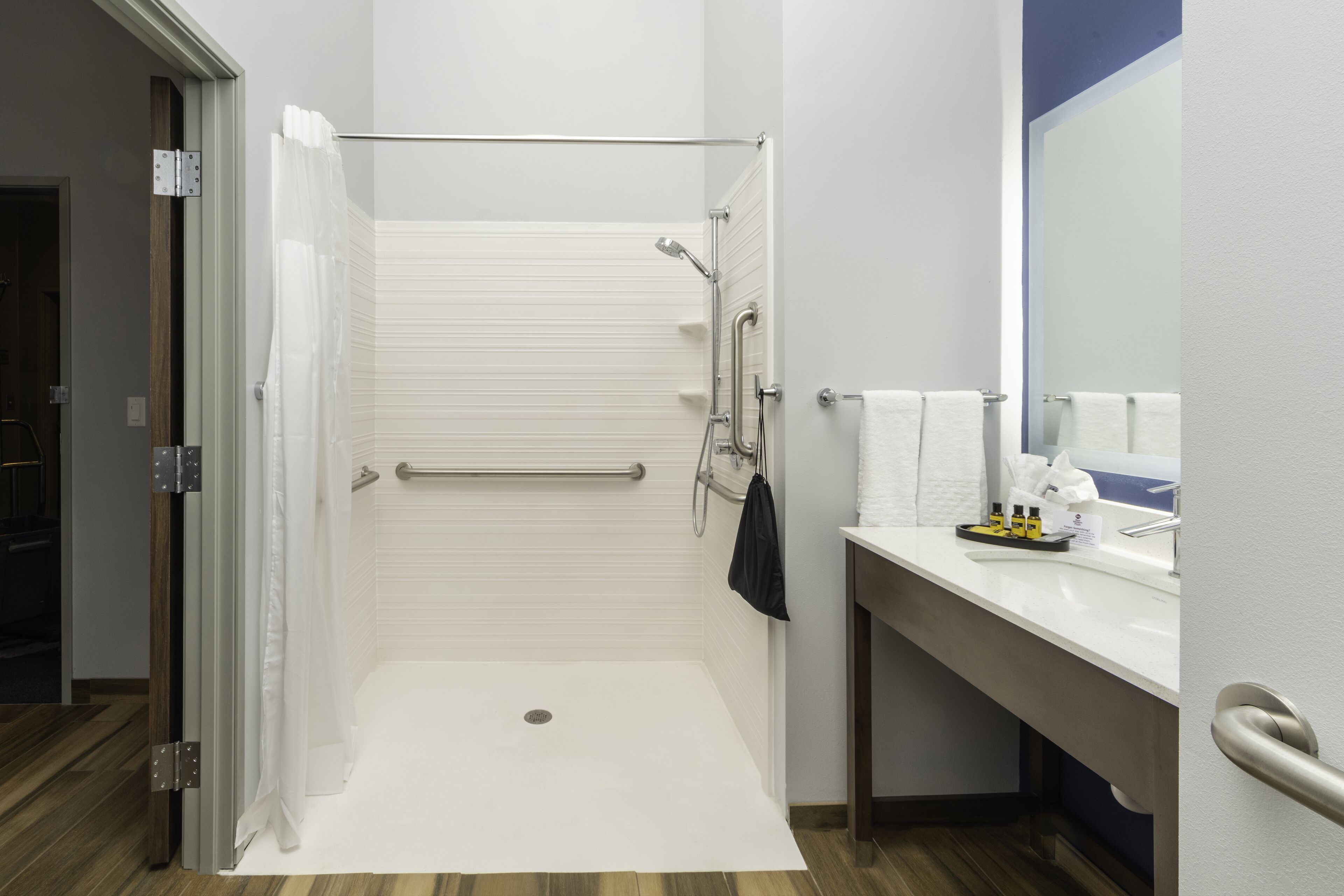 rainfall showerhead, free toiletries, hair dryer, towels