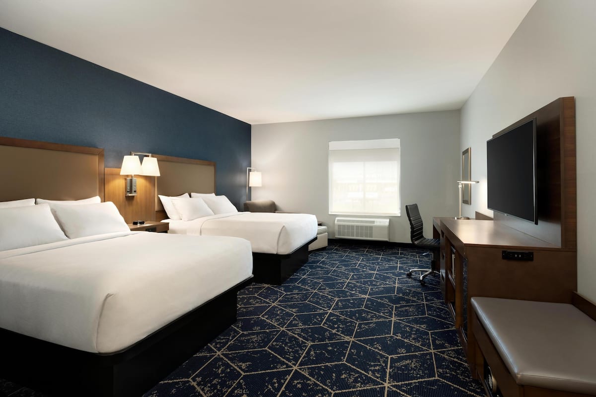 Room, 2 Queen Beds, Roll-in Shower | Pillowtop beds, in-room safe, desk, laptop workspace