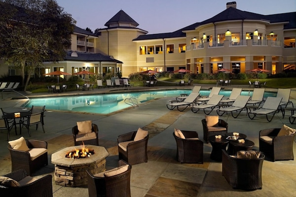 Indoor pool, outdoor pool, open 7:00 AM to 10:00 PM, pool umbrellas
