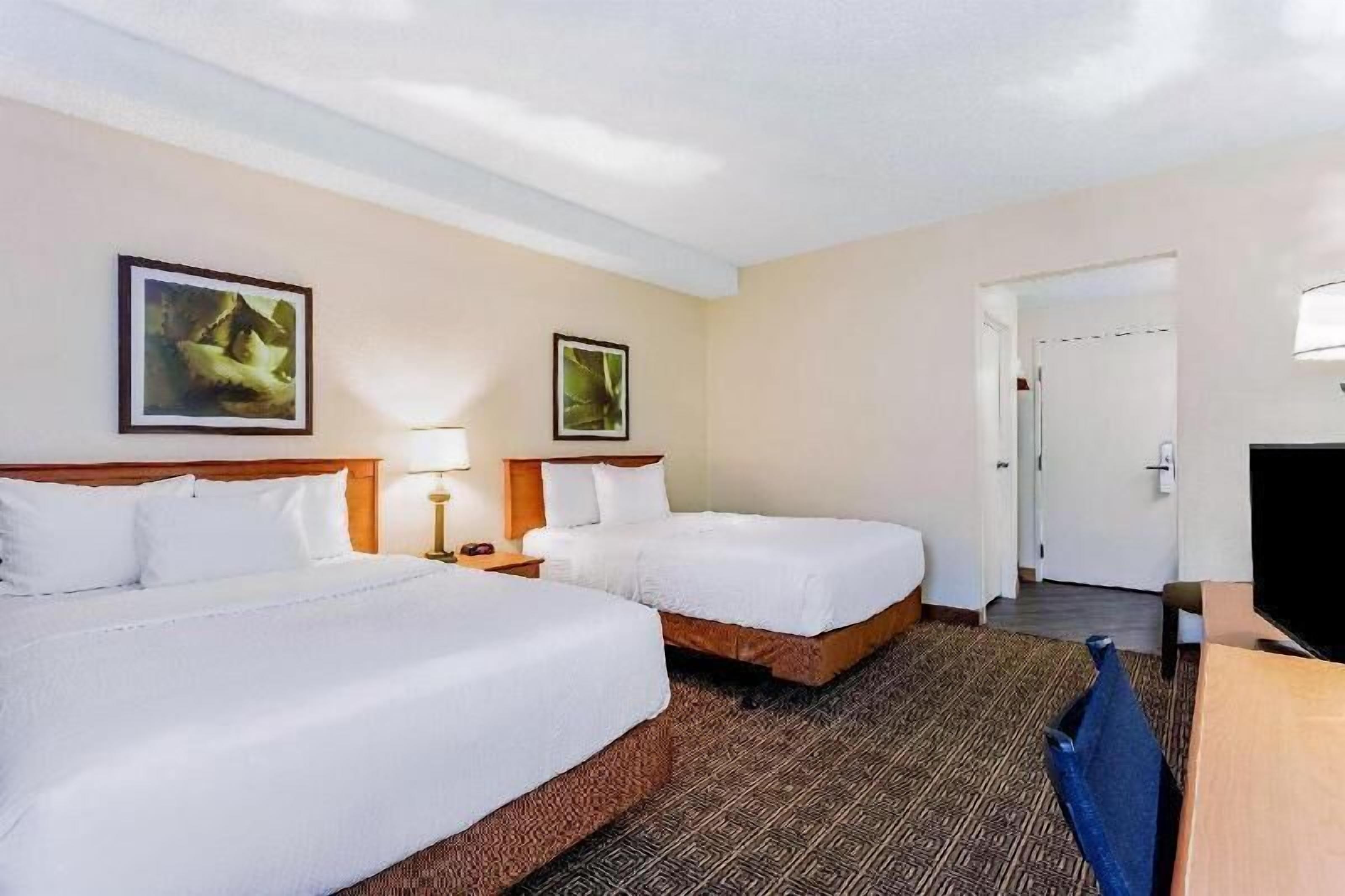 Premium bedding, pillowtop beds, in-room safe, desk