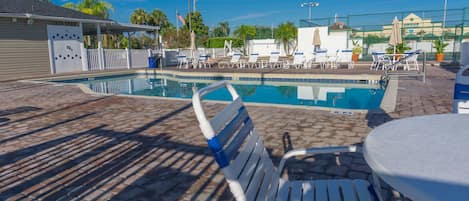 2 outdoor pools, open 7:00 AM to midnight, pool umbrellas, pool loungers