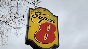 A sign for Super 8 with a 2020 renovation notice.