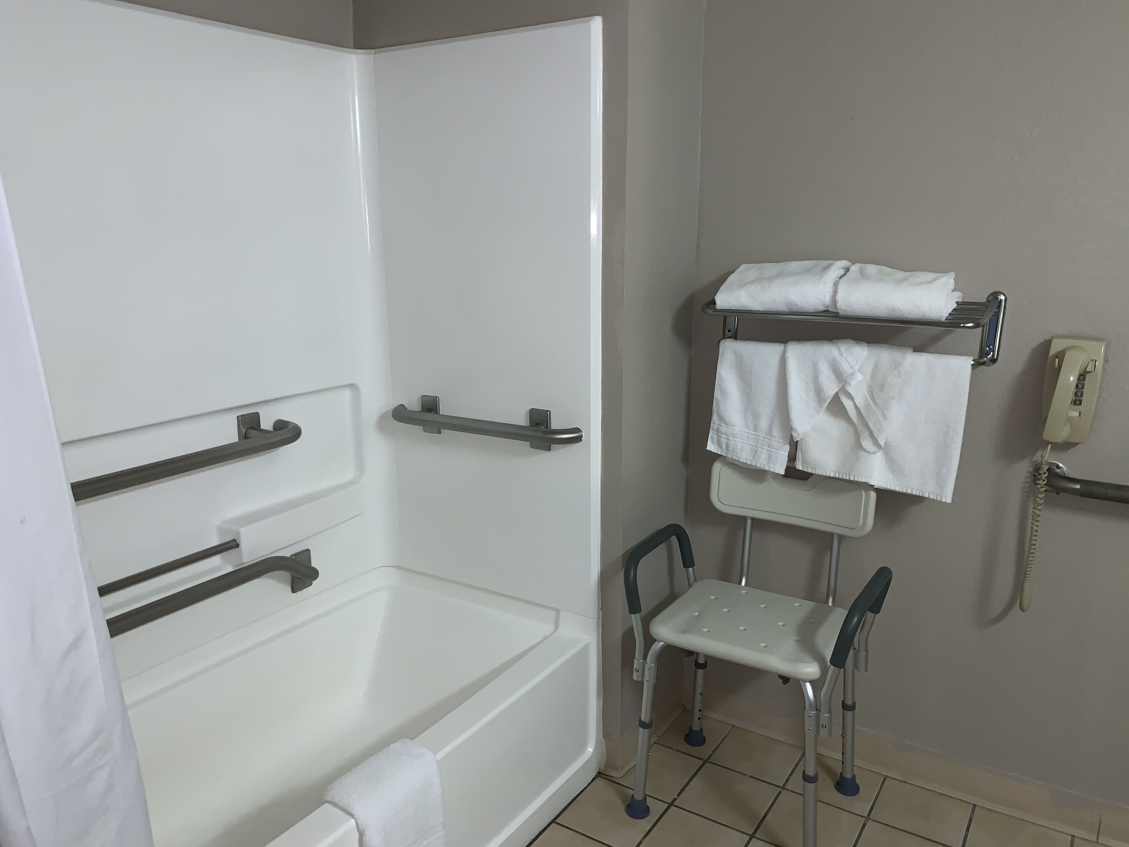 Room, 1 King Bed, Accessible, Non Smoking | Bathroom | Combined shower/bathtub, free toiletries, hair dryer, towels