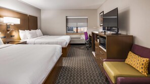A hotel room with two beds, a TV, a desk, a microwave, and a window with a view. - Country Inn & Suites by Radisson, Huntsville Research Park (Huntsville)