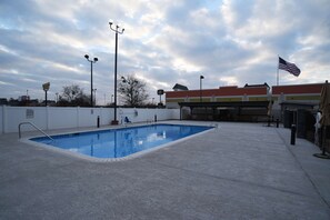 Seasonal outdoor pool, pool loungers