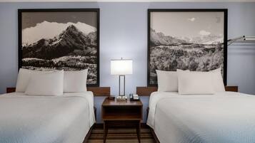 Room, 2 Queen Beds, Non Smoking, Ground Floor (First Floor) | Desk, blackout drapes, iron/ironing board, free cribs/infant beds