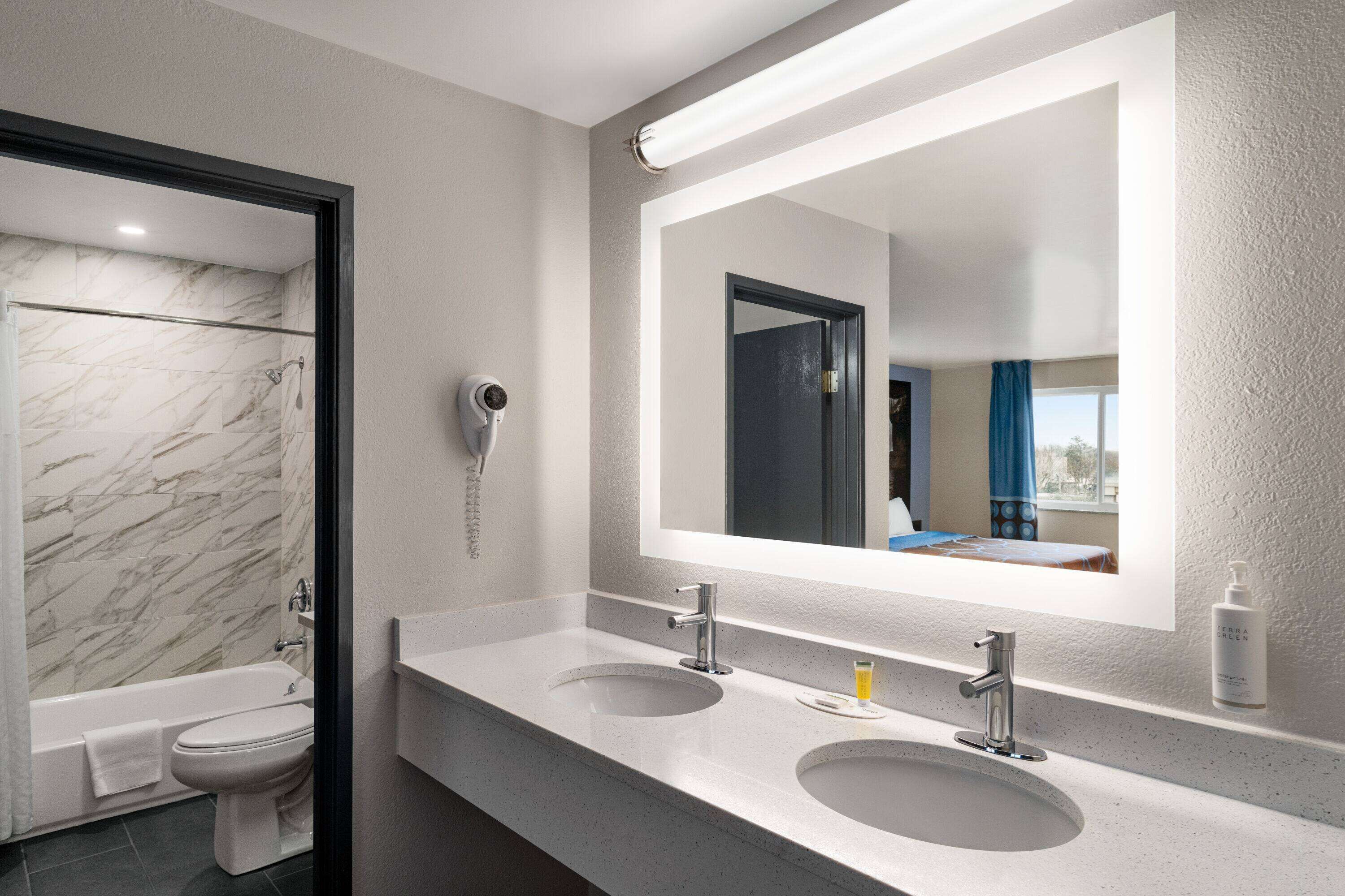 Combined shower/bathtub, deep-soaking bathtub, rainfall showerhead