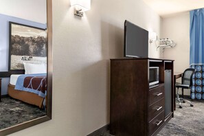 Desk, laptop workspace, blackout curtains, iron/ironing board
