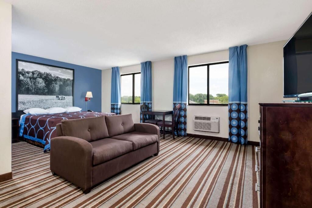 Desk, laptop workspace, blackout drapes, iron/ironing board
