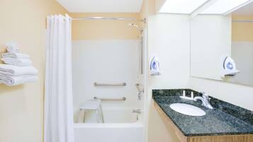 Combined shower/bathtub, free toiletries, hair dryer, towels