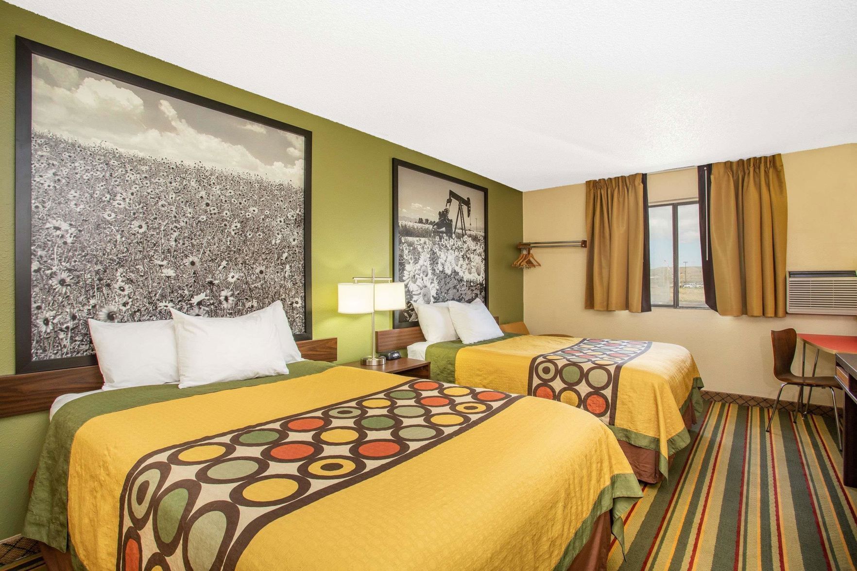 Premium bedding, pillowtop beds, desk, laptop workspace