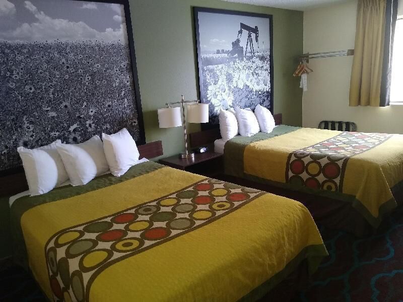 Premium bedding, pillowtop beds, desk, laptop workspace