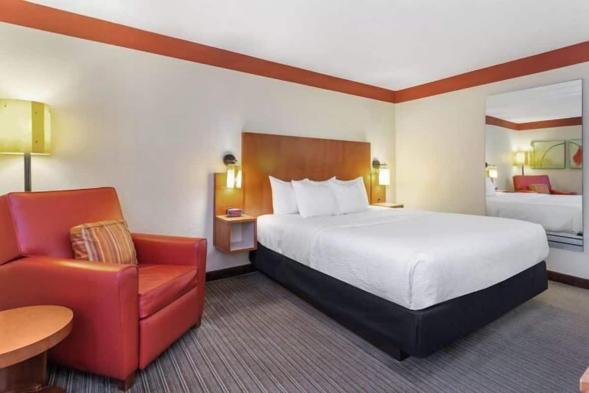 Premium bedding, desk, blackout drapes, iron/ironing board