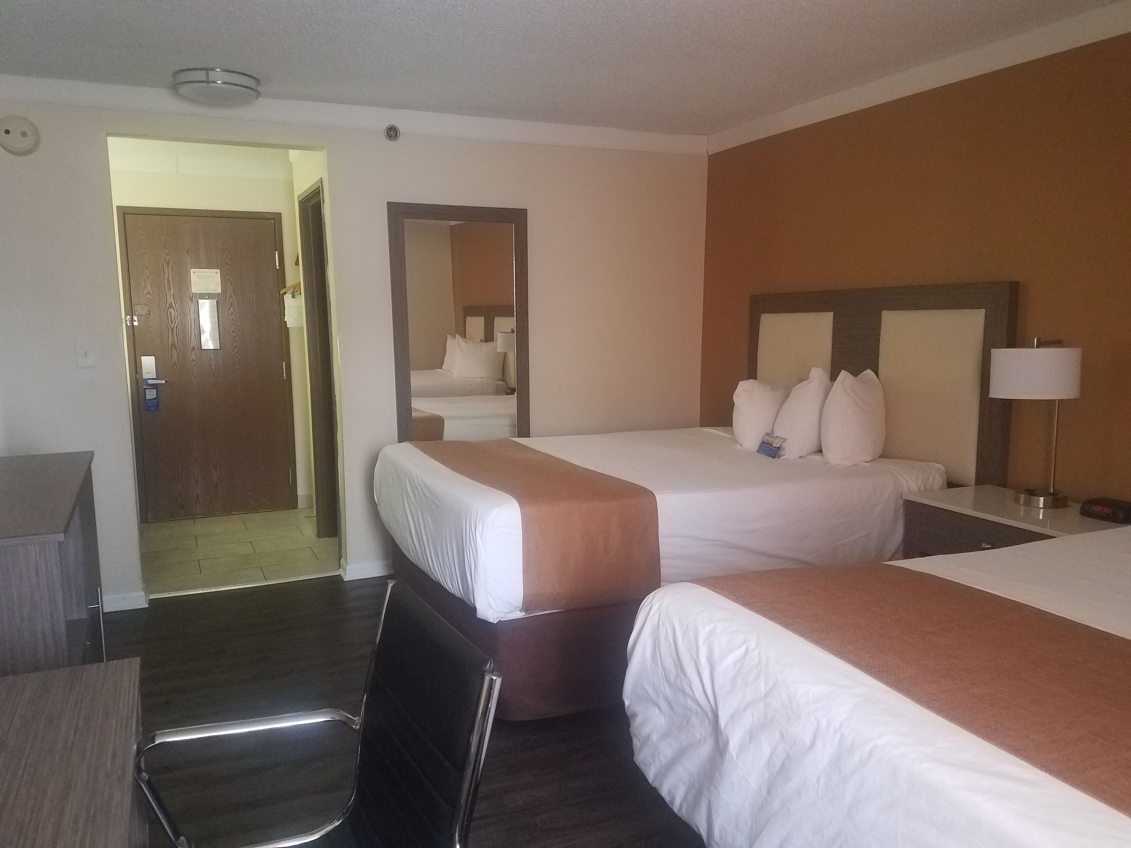 room, 2 queen beds, non smoking (pets welcome) | desk, iron/ironing board, free cots/infant beds, rollaway beds