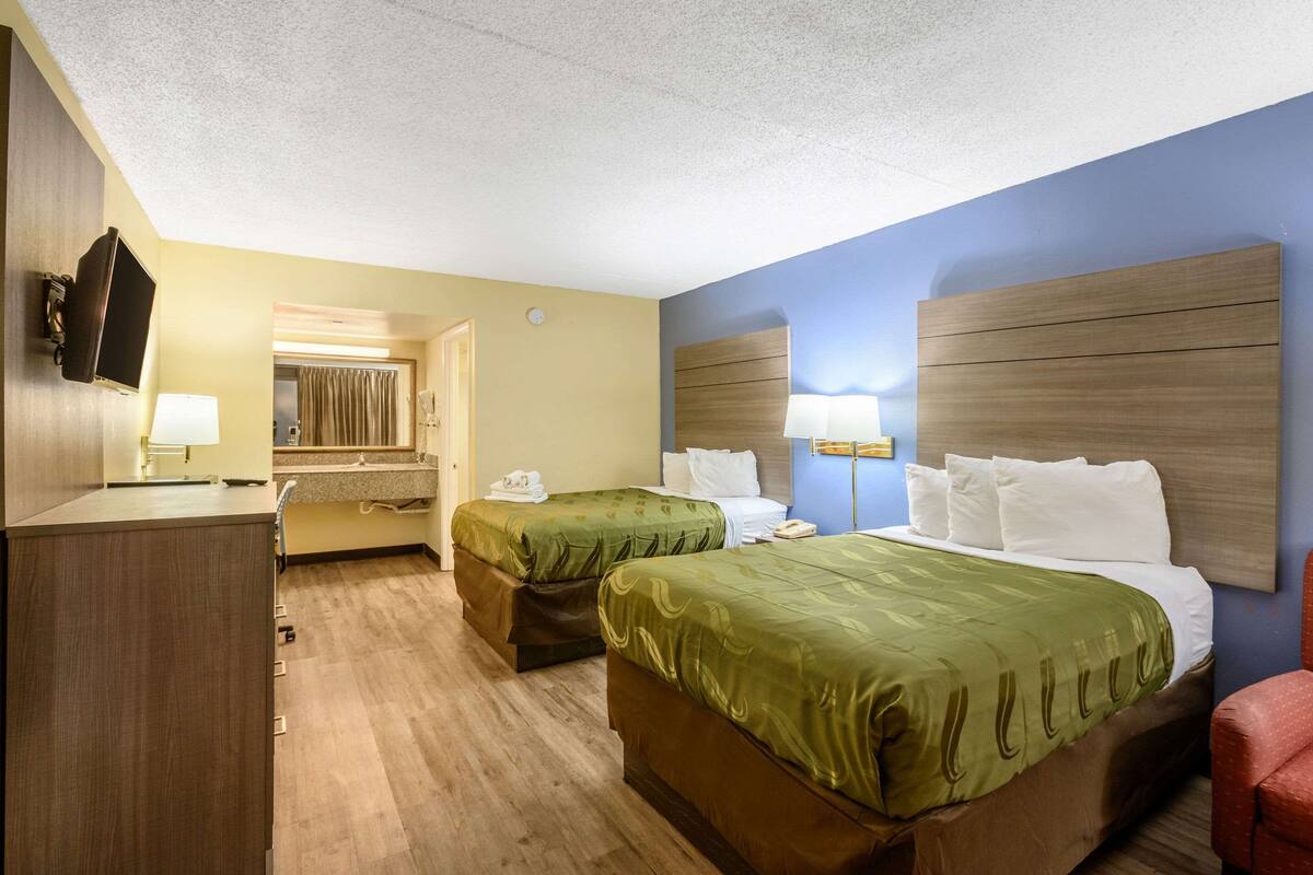 Suite, Multiple Beds, Non Smoking | Desk, blackout drapes, iron/ironing board (on request)