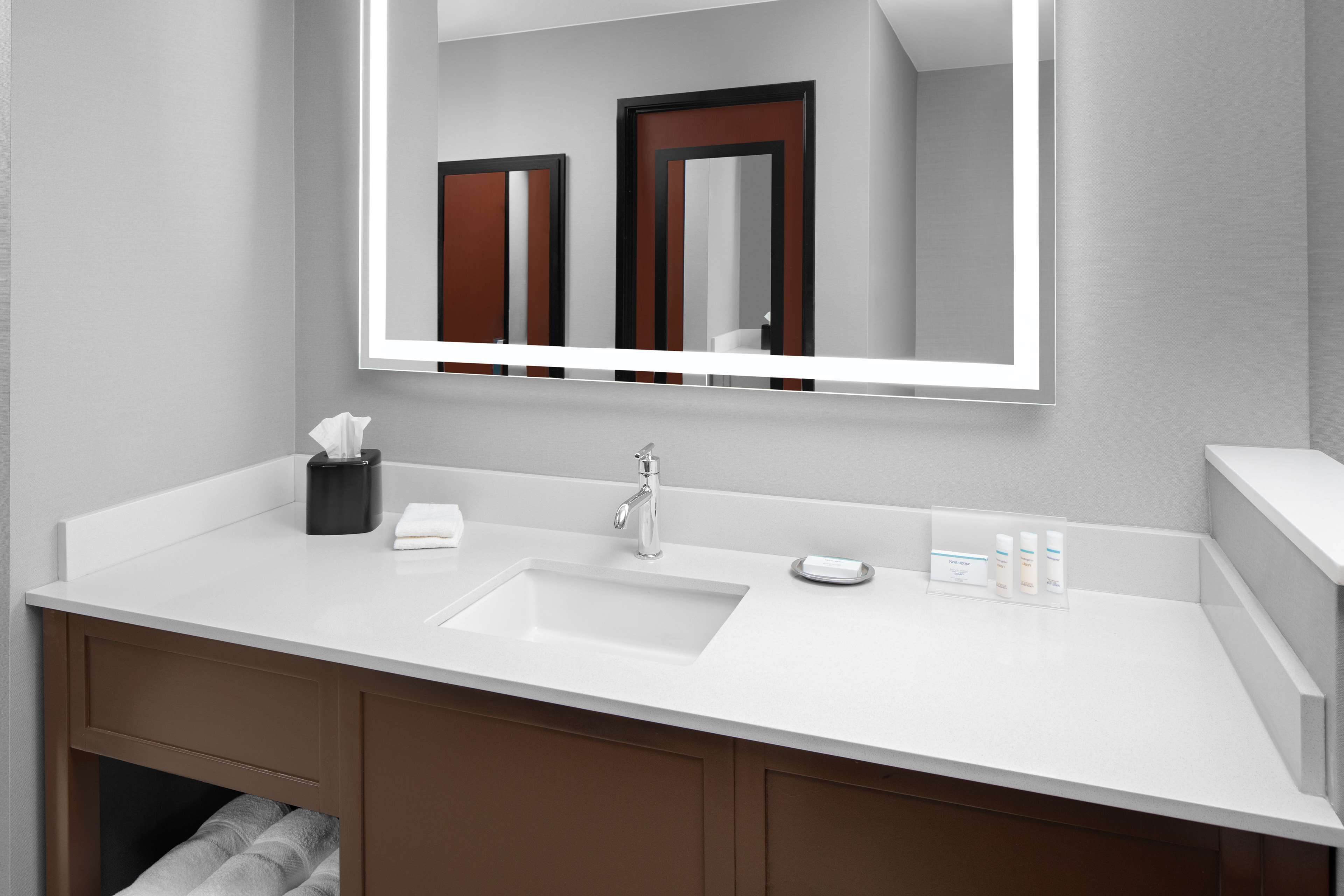 eco-friendly toiletries, hair dryer, towels