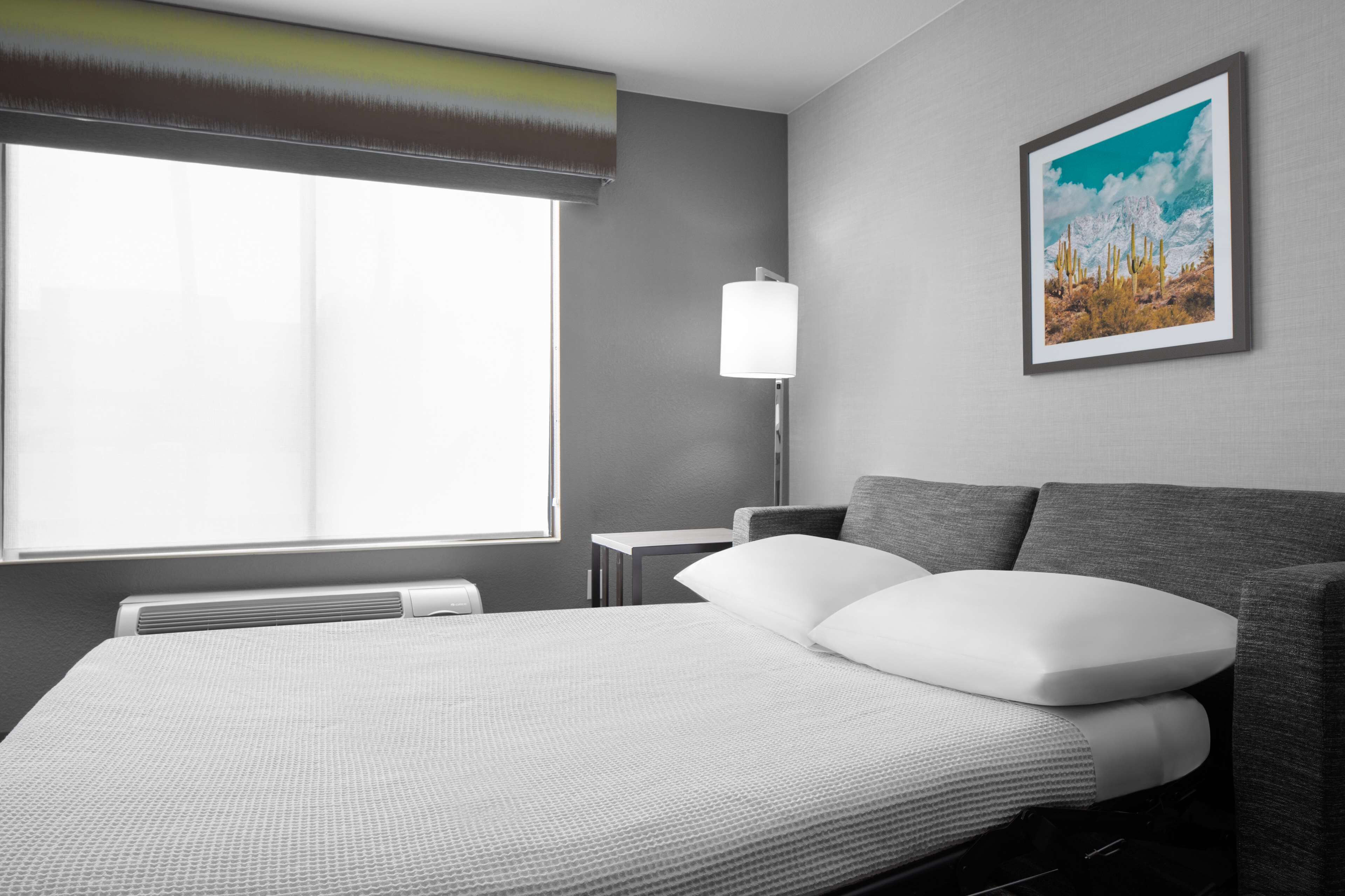 premium bedding, desk, blackout curtains, iron/ironing board