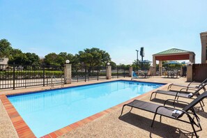 Outdoor pool, open 9:00 AM to 9:00 PM, sun loungers