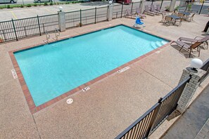 Outdoor pool, open 9:00 AM to 9:00 PM, sun loungers
